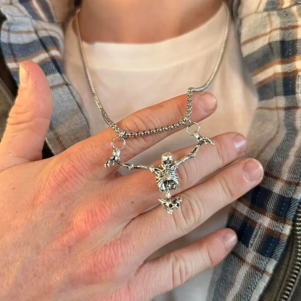 Unisex silver skeleton necklace featuring a bold, grunge-inspired design